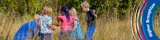 Children playing outside at Higher Broughton Nursery