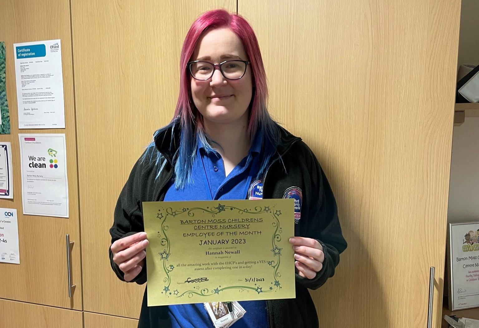 Hannah with her certificate